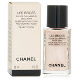 Luxurious Chanel highlighting fluid in Pearly Glow for a radiant, dewy finish and sun-kissed look, suitable for all skin types.