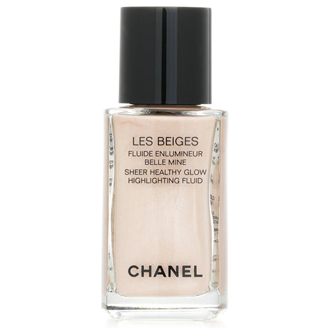 Lightweight Chanel highlighting fluid in Pearly Glow enhances skin with a dewy finish for a radiant, sun-kissed look.