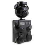 Moschino Toy Boy Eau De Parfum Spray in 100ml, a woody spicy fragrance with notes of bergamot, rose, and vetiver.