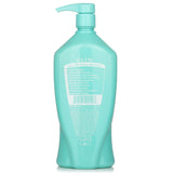 Shine-boosting 1000ml shampoo designed for daily use, enhances gloss, volume, and protects color while smoothing hair.