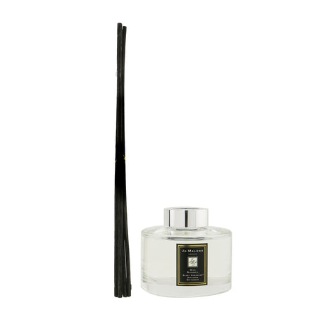 Jo Malone Wild Bluebell Scent Surround Diffuser in a stylish container, infusing spaces with floral aroma for 4-5 months.