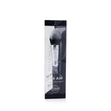 Sigma Beauty F74 Air Domed Buffer Brush with soft bristles for flawless application of concealer and color-correctors, vegan-friendly.