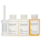 Olaplex Traveling Stylist Kit with 1x No. 1 Bond Multiplier and 2x No. 2 Bond Perfector for revitalizing damaged hair.