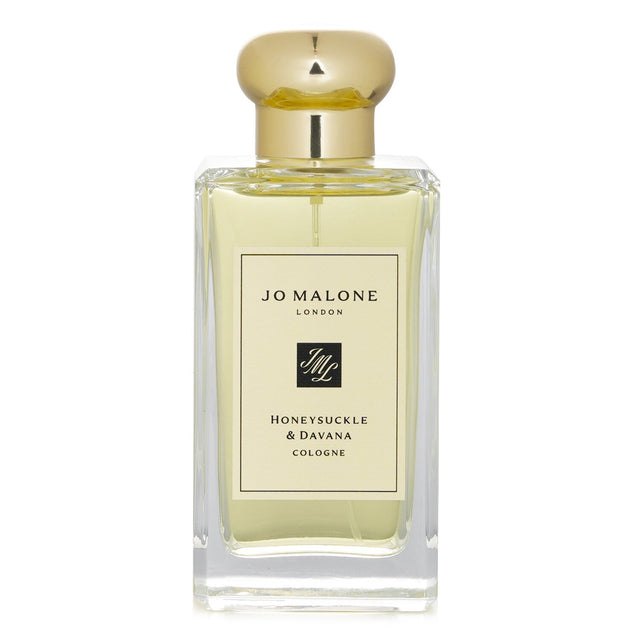 Elegant Jo Malone Honeysuckle & Davana cologne in a gift box, featuring floral notes and warm, sensual undertones.