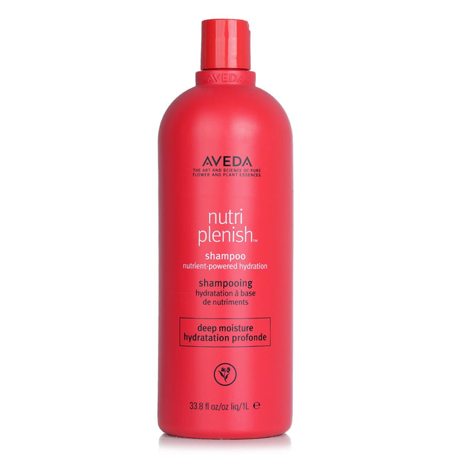 Aveda Nutriplenish Deep Moisture Shampoo 1000ml, a vegan formula with coconut oil and mango butter for hydration and shine.