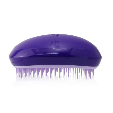 Professional detangling brush in Violet Diva, designed to smooth all hair types without tugs or pulls.