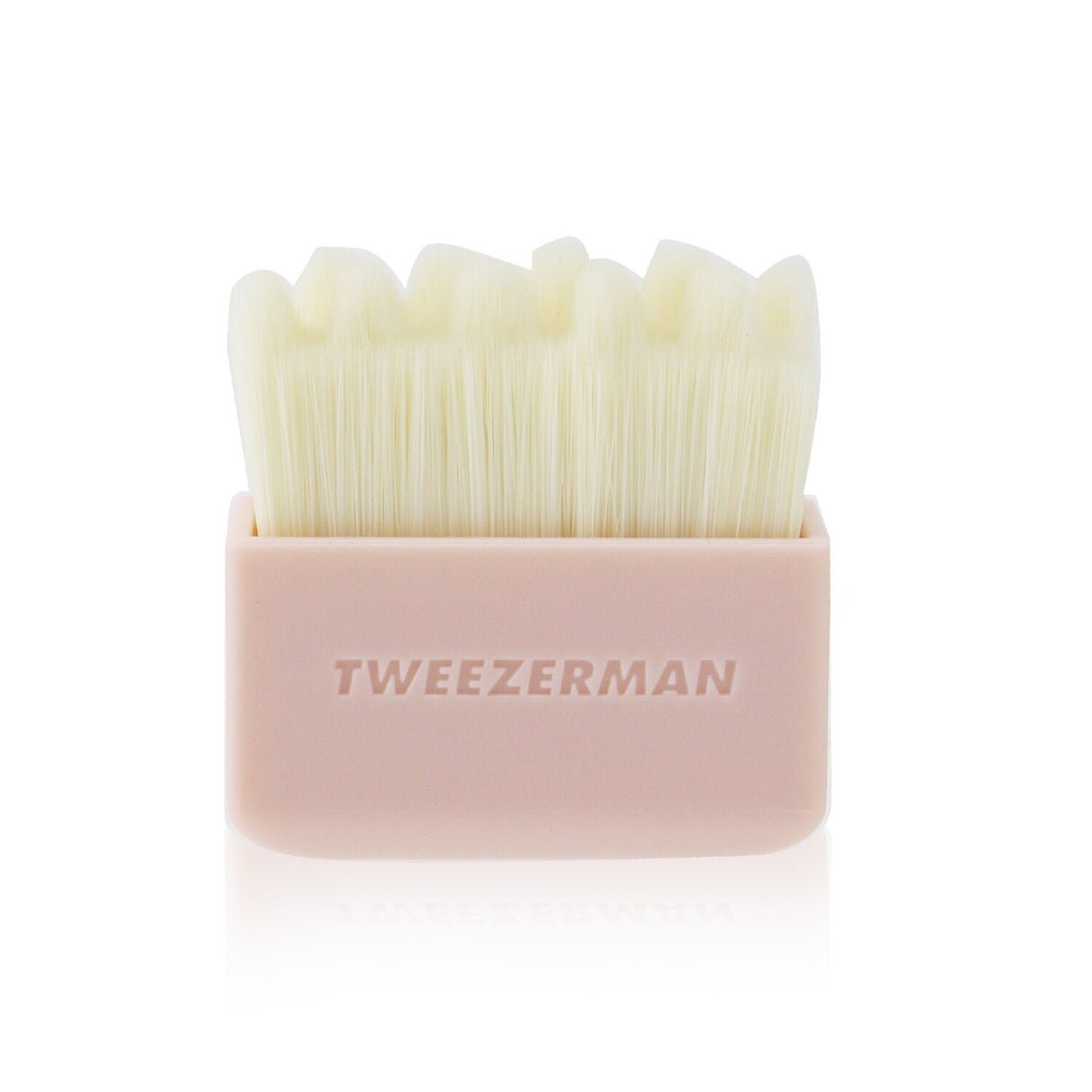 Tweezerman Dry Face Brush with soft bristles, designed to exfoliate, stimulate circulation, and enhance skin's glow.