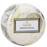 Voluspa Nissho Soleil mini tin candle with Japanese-inspired design, featuring a coconut wax blend for a clean, enchanting fragrance.