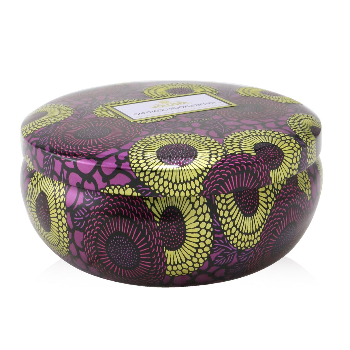 Voluspa 3 Wick Decorative Tin Candle in Santiago Huckleberry, with vibrant metallic pattern and floral-fruity scent, 40-hour burn.