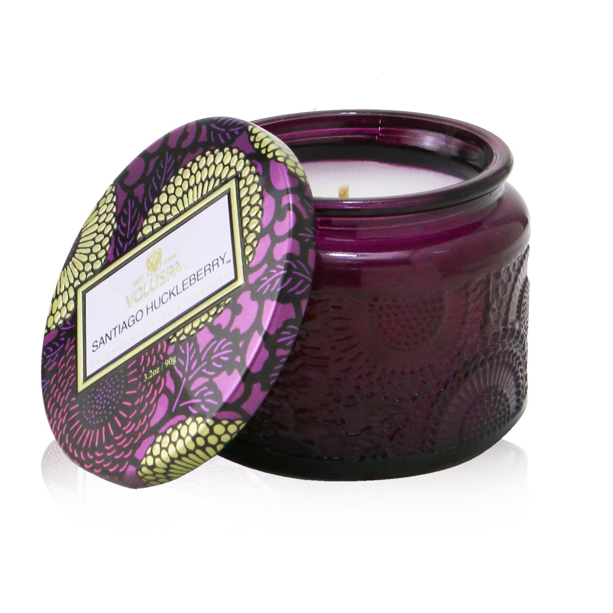 Voluspa Santiago Huckleberry candle in a decorative jar, emits a sweet, fruity aroma with a burn time of 25 hours.