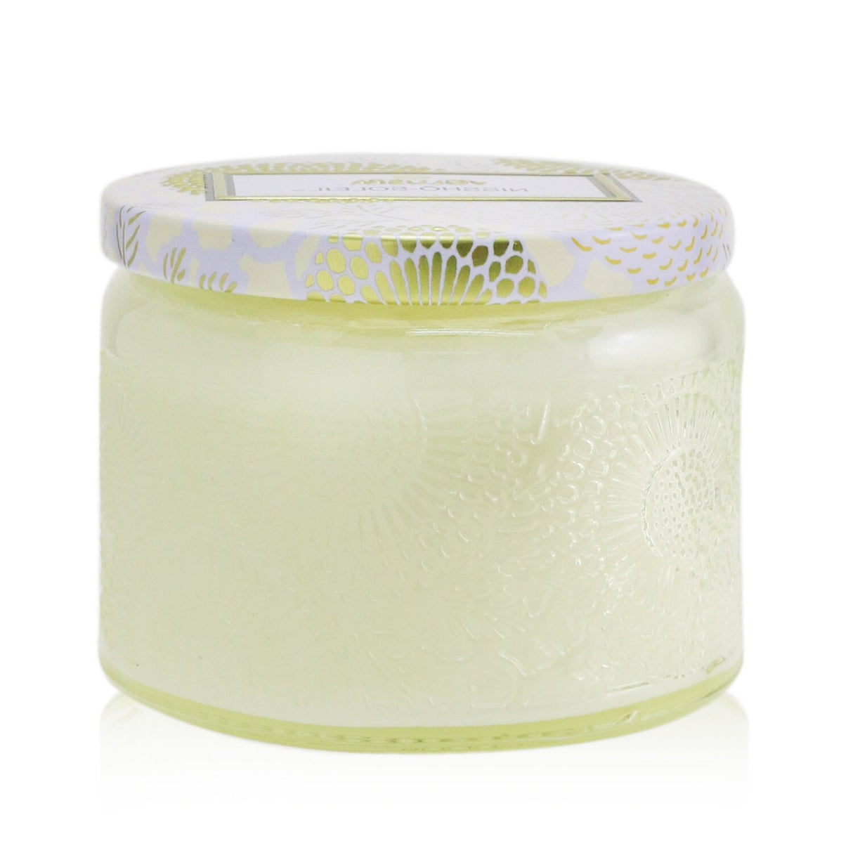 Voluspa Petite Jar Candle in Nissho Solei, featuring a vibrant design, coconut wax, and a 25-hour burn time.
