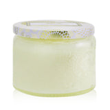 Voluspa Petite Jar Candle in Nissho Solei, featuring a vibrant design, coconut wax, and a 25-hour burn time.