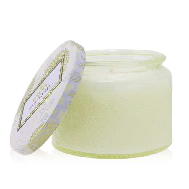 Voluspa Petite Jar Candle in Nissho Solei, a chic, fragrant candle with Japanese-inspired design, crafted from coconut wax.