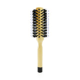 Round brush for thick and curly hair, featuring wild boar bristles for gentle drying and frizz-free, shiny results.