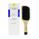 Radiance brush with supple bristles for gentle detangling and scalp stimulation, enhancing hair's shine and health.