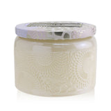 Voluspa Santal Vanille Petite Jar Candle, eco-friendly with a warm sandalwood and vanilla scent, in a decorative jar.
