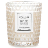 Elegant Voluspa Classic Candle in rose-colored glass, featuring a coconut wax blend and floral fragrance for 40 hours of ambiance.