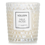 Voluspa Milk Rose candle in elegant glass, hand-poured with coconut wax, offering a romantic floral fragrance and 40-hour burn time.
