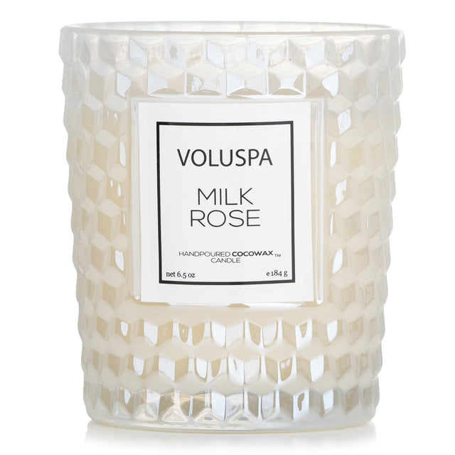 Voluspa Milk Rose candle in elegant glass, hand-poured with coconut wax, offering a romantic floral fragrance and 40-hour burn time.