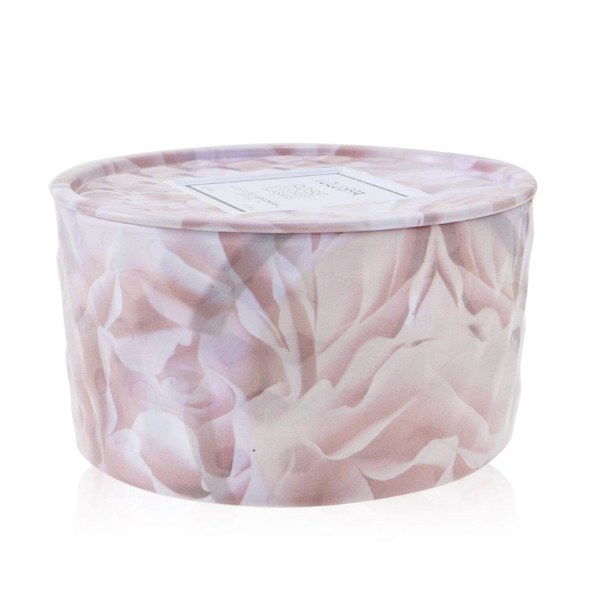 Voluspa 2 Wick Tin Candle in rose-colored glass, featuring a geometric embossed tin and a heavenly rose fragrance.