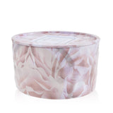 Voluspa 2 wick tin candle in rose-colored glass, featuring coconut wax, natural wicks, and elegant geometric tin design.