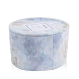 Voluspa Milk Rose candle in an elegant tin, featuring 2 wicks, fragrant rose and milk blend, and a 25-hour burn time.