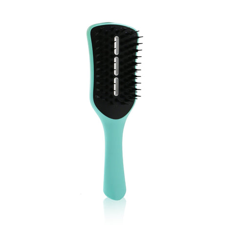 Vented blow-dry brush in Sweet Pea color, detangling hair while adding bounce and shine for a smooth finish.