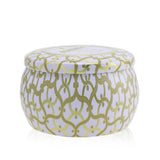 Voluspa Mini Tin Candle in Suede Blanc: Hand-poured coconut wax candle with a vibrant tin, offering 25 hours of soothing fragrance.