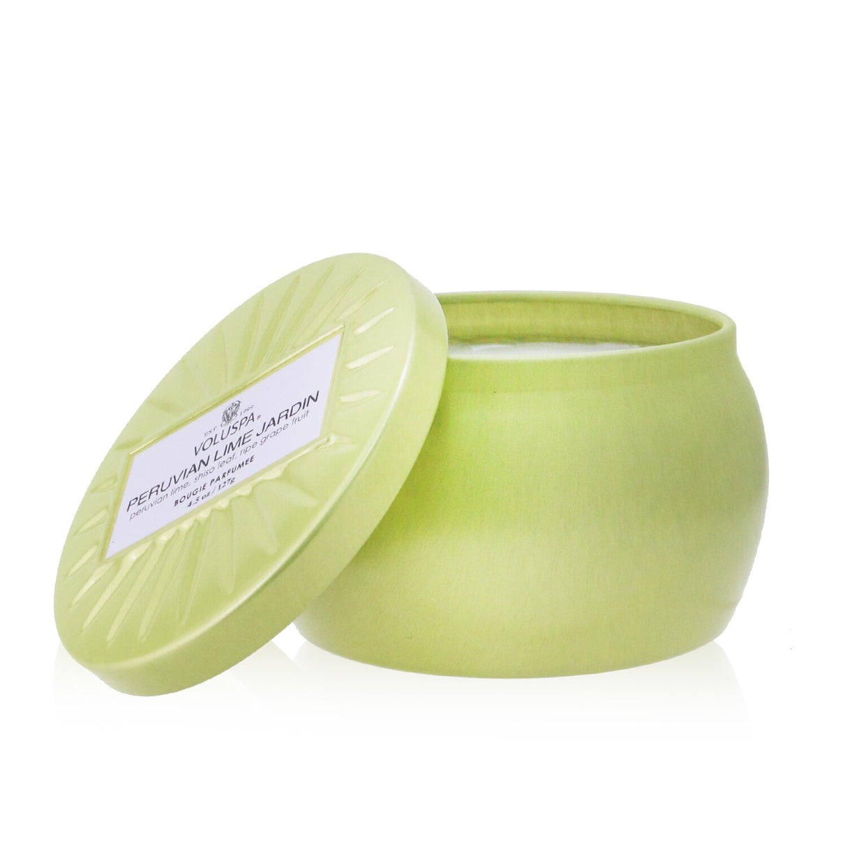 Voluspa Mini Tin Candle in Peruvian Lime Jardin: vibrant tin design, eco-friendly coconut wax, natural wicks, 25-hour burn time.