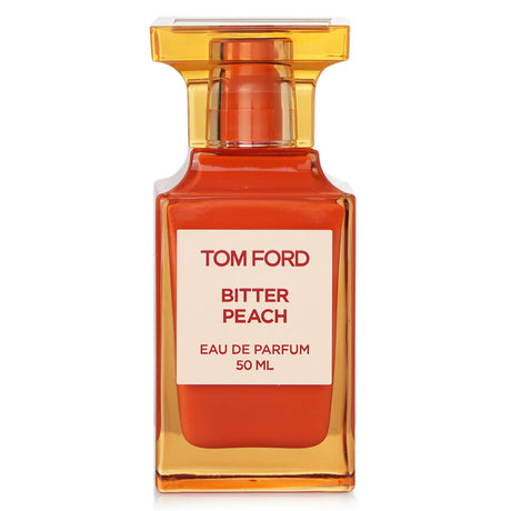 Tom Ford Bitter Peach Eau De Parfum Spray, 50ml - a luxurious unisex fragrance with notes of peach, rum, and patchouli.