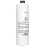 Nourishing shampoo for dry, damaged hair with Aloe Vera, Ginseng, and Guarana for hydration, repair, and scalp health.