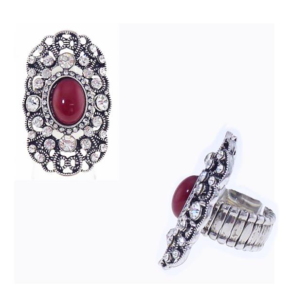 Antique silver filigree ring featuring a red stone and diamante, designed with elasticated band for comfort.