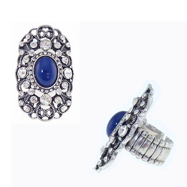 Antique silver filigree ring featuring an oval blue stone and diamante details, with an elasticated band.