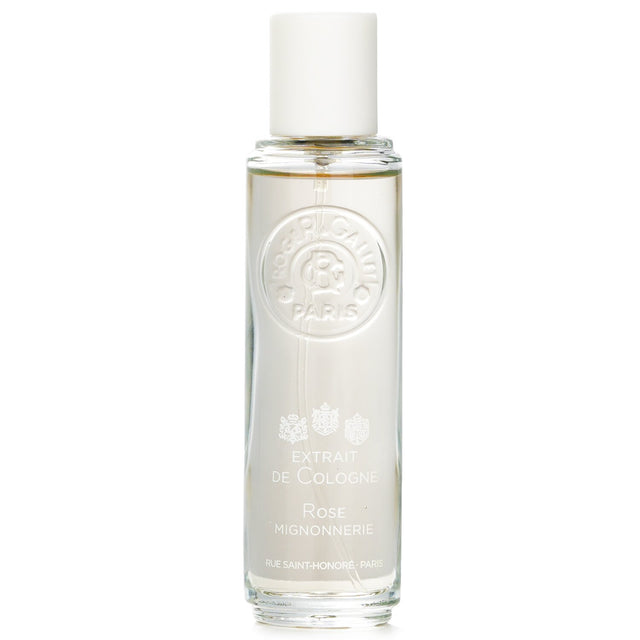 Floral cologne spray with rose, mandarin, and cedar notes, in a 30ml bottle, perfect for elegant, contemporary women.