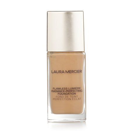 Laura Mercier Flawless Lumiere Foundation #4W1.5 Tawny, a lightweight, hydrating foundation for a radiant, even complexion.