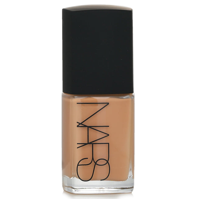 NARS Sheer Glow Foundation in Valencia, a 30ml liquid foundation for a radiant, buildable coverage and improved skin texture.