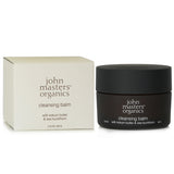 John Masters Organics Cleansing Balm with Kokum Butter & Sea Buckthorn in an 80g jar for gentle makeup removal and hydration.