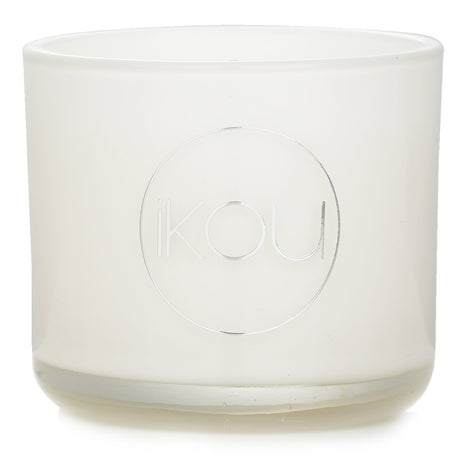 A soothing natural wax candle in elegant glass, infused with lavender, geranium, and uplifting citrus scents for relaxation.