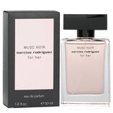 Elegant 50ml bottle of Narciso Rodriguez Musc Noir Eau De Parfum, featuring notes of plum, rose, and leather suede.