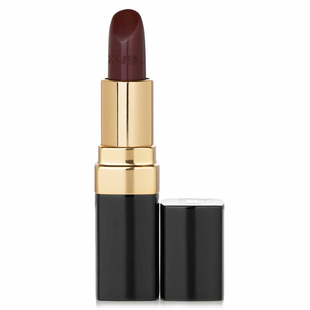 Chanel Rouge Coco lipstick in #494 Attraction, a hydrating shade with Jojoba and Mimosa Butters for vibrant, smooth lips.