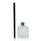 Elegant glass cube diffuser in Hibiscus Love scent, featuring engineered polymer sticks for optimal fragrance diffusion.