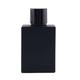 Woody spicy fragrance for men, featuring fresh citrus, ginger, and warm musk in a stylish 50ml bottle.