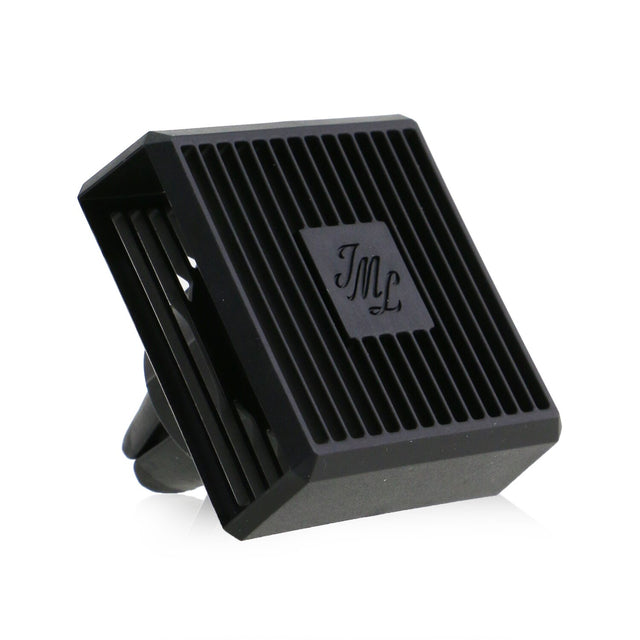 Sleek Jo Malone car diffuser case, securely attaches to air vent, enhances driving experience with delightful fragrances.