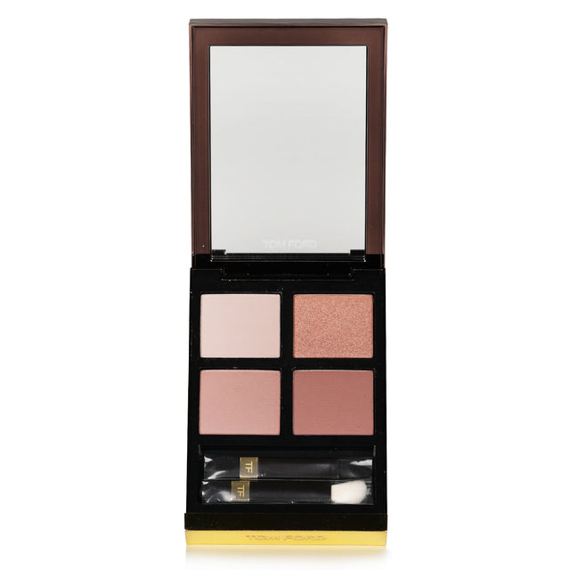 Tom Ford Eye Color Quad in #31 Sous Le Sable features four luxurious shades for versatile eye makeup looks in a chic compact.