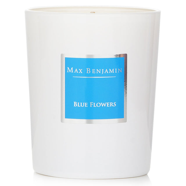 Max Benjamin Blue Flowers Candle in an elegant glass container, offering a romantic floral scent and a 40-hour burn time.