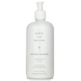 Bjork & Berries Never Spring Hand & Body Lotion in a 400ml bottle, featuring a creamy texture for deep hydration and a calming scent.