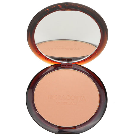 Guerlain Terracotta Bronzing Powder provides a radiant, sun-kissed glow with 96% natural ingredients and hydrating Argan oil.