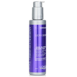 Violet-infused hair treatment to enhance cool blonde tones and neutralize yellow undertones for vibrant color.