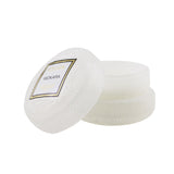 Voluspa Macaron Candle in Mokara with geometric glass container, coconut wax, and natural wicks for enchanting scent and décor.