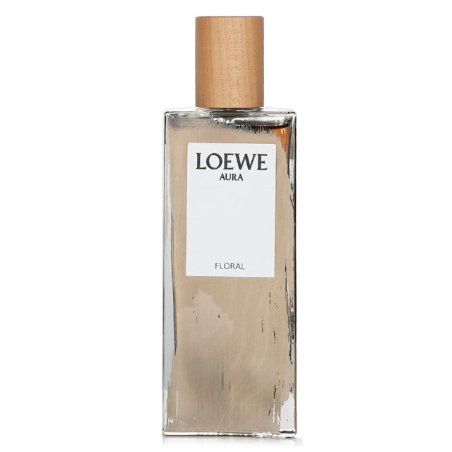 Loewe Aura Floral Eau De Parfum Spray in elegant packaging, featuring floral notes for a sophisticated, long-lasting scent.